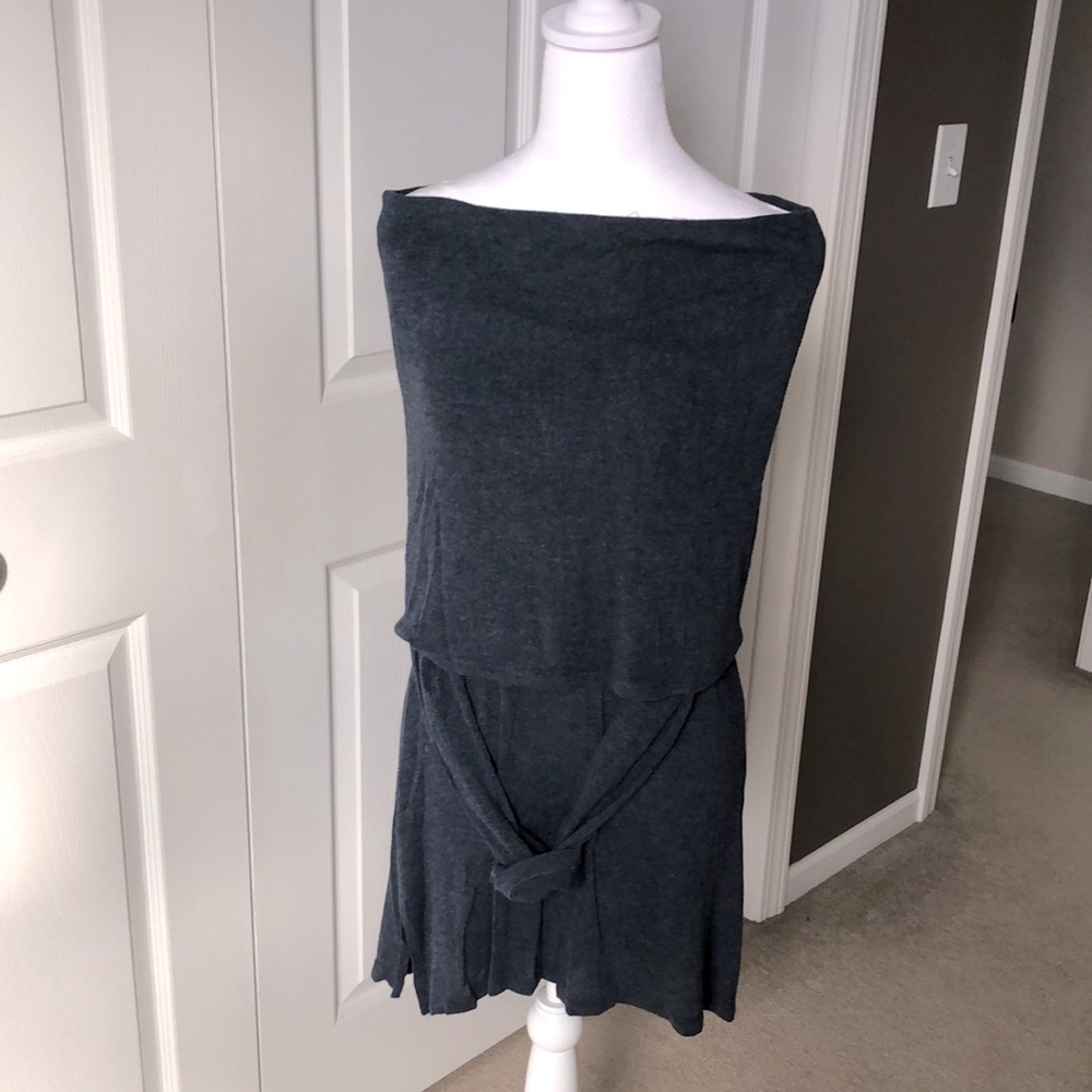 Lightweight sweater. Worn 1 time. Can be worn over/off shoulder. Size S